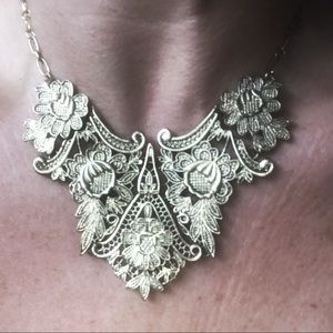 Gold toned, antique style bib necklace